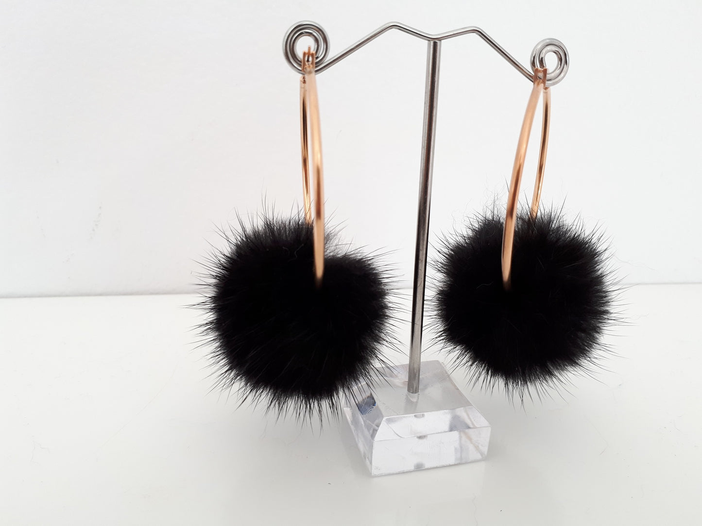 Stainless steel Hoop Earrings with fur pompom.