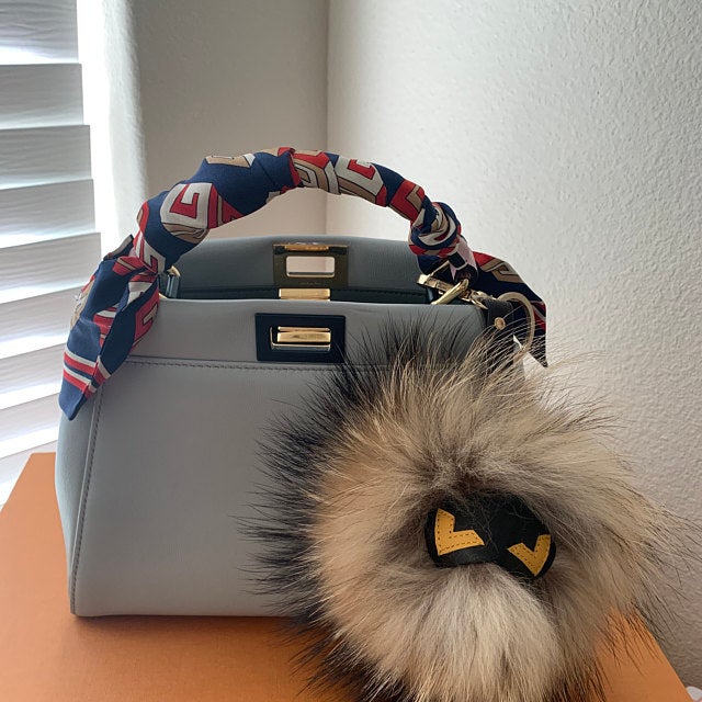 Monster face Raccoon FUR Keychain. REAL fur pompom keyring with genuine leather mask and strap.