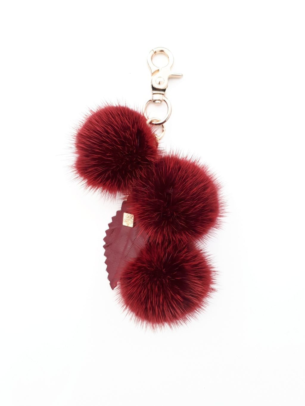 Mink pompom Bag Charm with Chain and Real leather Leaf.
