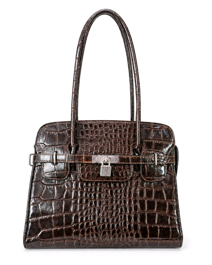 Brown crocodile skin handbag with silver hardware on a white background