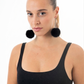 Lime Green Fur Pom Pom Earrings in stainless steel hoops