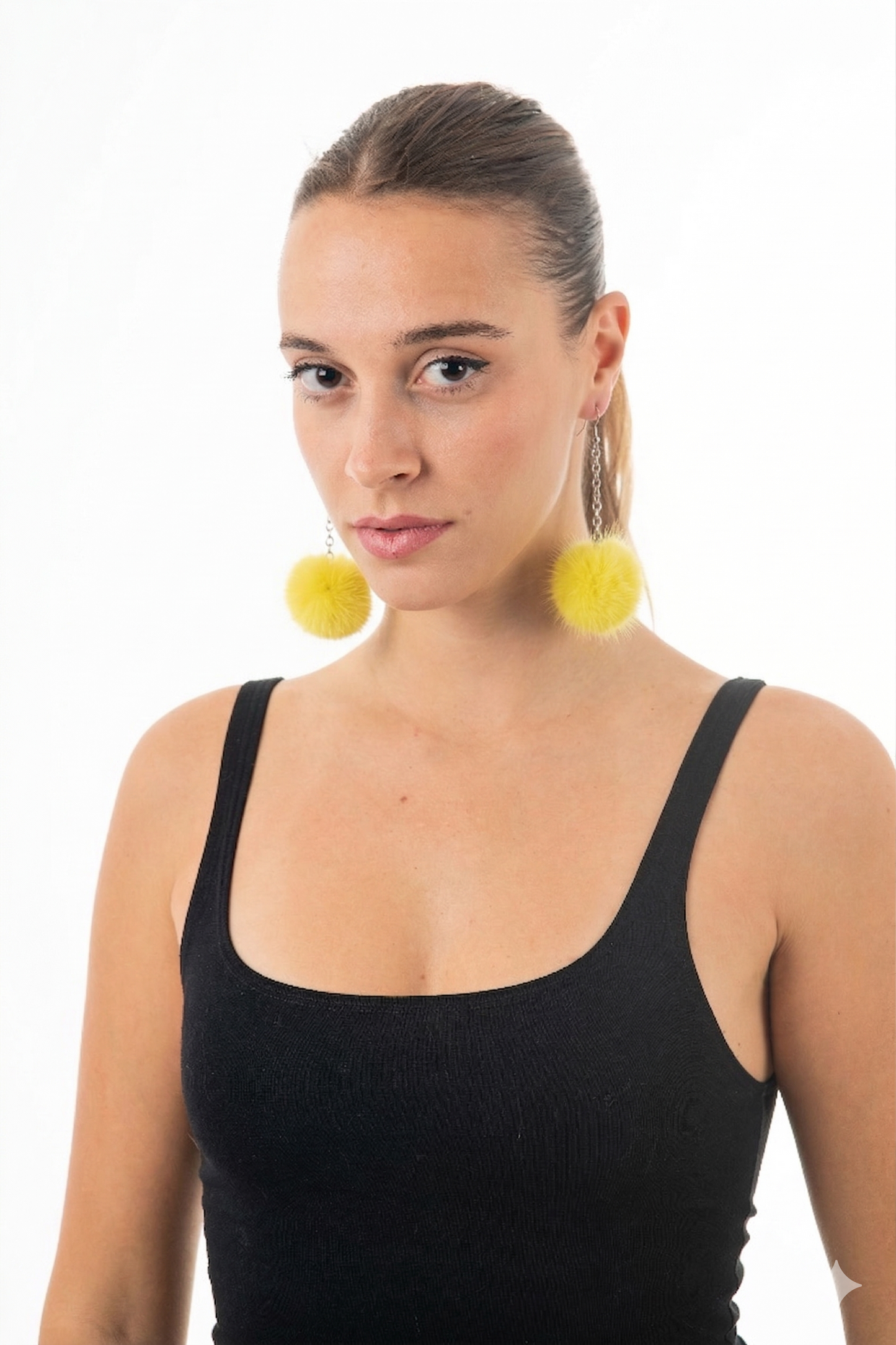 Lime Green Fur Pom Pom Earrings in stainless steel hoops